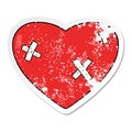 distressed sticker of a cartoon beaten up heart Royalty Free Stock Photo