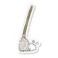 distressed sticker of a cartoon broom sweeping