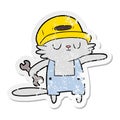 distressed sticker of a cartoon cat builder Royalty Free Stock Photo