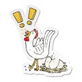 distressed sticker of a cartoon chicken laying egg