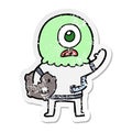 distressed sticker of a cartoon cyclops alien spaceman waving