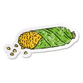 distressed sticker cartoon doodle of fresh corn on the cob Royalty Free Stock Photo