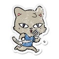 distressed sticker of a cartoon hungry cat