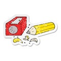 distressed sticker of a cartoon pencil and sharpener Royalty Free Stock Photo