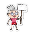 distressed sticker of a cartoon protester woman wearing spectacles