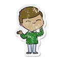 distressed sticker of a cartoon shy smiling boy Royalty Free Stock Photo