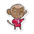 distressed sticker of a cartoon suspicious monkey