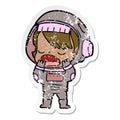 distressed sticker of a cartoon talking astronaut yawning