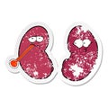 distressed sticker of a cartoon unhealthy kidney