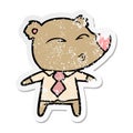 distressed sticker of a cartoon whistling bear boss