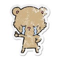 distressed sticker of a crying cartoon bear giving thumbs up