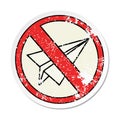 distressed sticker of a cute cartoon no paper aeroplanes allowed