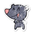 distressed sticker of a laughing bear with crossed arms cartoon