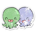 distressed sticker of a two cartoon octopi