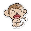 distressed sticker of a yawning cartoon monkey