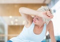 Distressed woman painful in large bright room