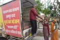 Distribute Food for Poor Womens by Narayan Seva Sansthan. Royalty Free Stock Photo