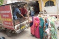 Distribute Food for Poor Womens. Royalty Free Stock Photo