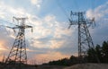 Distribution electric substation with power lines and transformers, at sunset Royalty Free Stock Photo