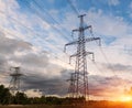 Distribution electric substation with power lines and transformers, at sunset Royalty Free Stock Photo