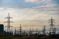 Distribution electric substation with power lines and transformers, at sunset Royalty Free Stock Photo