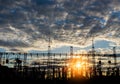 Distribution electric substation, pylon with lines, at sunset Royalty Free Stock Photo