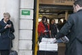 Distribution of the Evening Standard free newspaper on the Stra Royalty Free Stock Photo