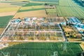 Distribution substation in the middle of the field, power plant and many power lines. Aerial view Royalty Free Stock Photo