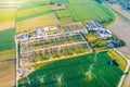 Distribution substation in the middle of the field, power plant and many power lines. Aerial view Royalty Free Stock Photo