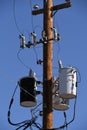 Distribution transformers and power lines. Royalty Free Stock Photo