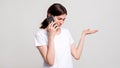 Disturbed woman portrait phone call weird offer Royalty Free Stock Photo