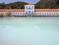 A disused and abandoned hydrotherapy facility with a thermal water pool at the Methana spa resort in the Peloponnese in Greece