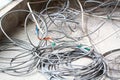 Disused discarded ruined abandoned LAN cable wires roll circle rope on the floor renovation decoration refurbish garbage trash