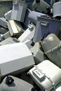 Disused gas counters in a special waste landfillpiles of old d Royalty Free Stock Photo