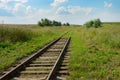 disused railway track on field