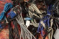 Disused stack of old computer cables and devices Royalty Free Stock Photo