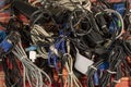 Disused stack of old computer cables and devices Royalty Free Stock Photo
