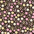 Ditsy floral seamless pattern in vector. Cute little flowers in pink, yellow and white colors on dark background Royalty Free Stock Photo