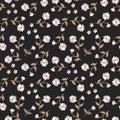 Ditsy seamless elegant pattern with small white flowers isolated on black background. Print for fabric