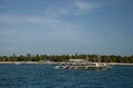 Dive boats moored of the beach in Malapascua