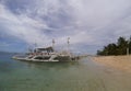 Dive boats moored of the beach in Malapascua