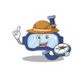 Dive glasses mascot design style of explorer using a compass during the journey Royalty Free Stock Photo