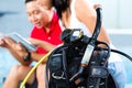 Dive master and student in Asian diving school Royalty Free Stock Photo