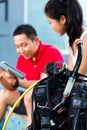 Dive master and student in Asian diving school Royalty Free Stock Photo