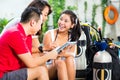 Dive master and students in Asian diving school Royalty Free Stock Photo