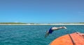 Dive In - Woman Dives Into Caribbean Sea