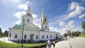 Unknown pilgrims go near Kazan Cathedral, Church of Nativity of Christ and Church of Nativity of Virgin in Holy Trinity Seraphim- Royalty Free Stock Photo