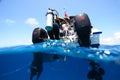 Diver climbing into a boat