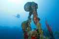 Diver Descending Toward Shipwreck Scaffolding