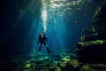 Diver explores Yucatan cenote cave with dark, stalactite filled landscape underwater